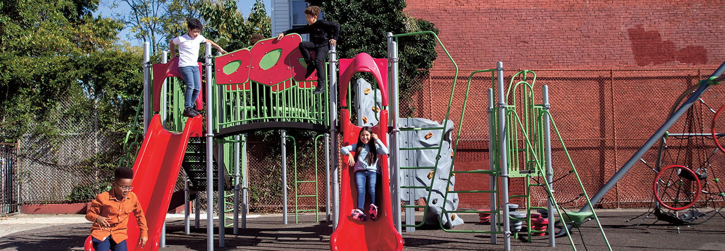 Photo of kids playing on a playground